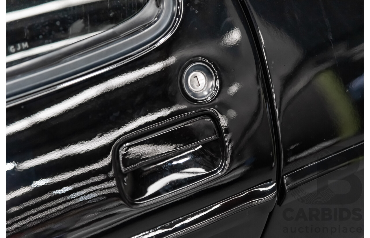 1/1985 Porsche 928 S  2d Coupe Black 4.7L V8