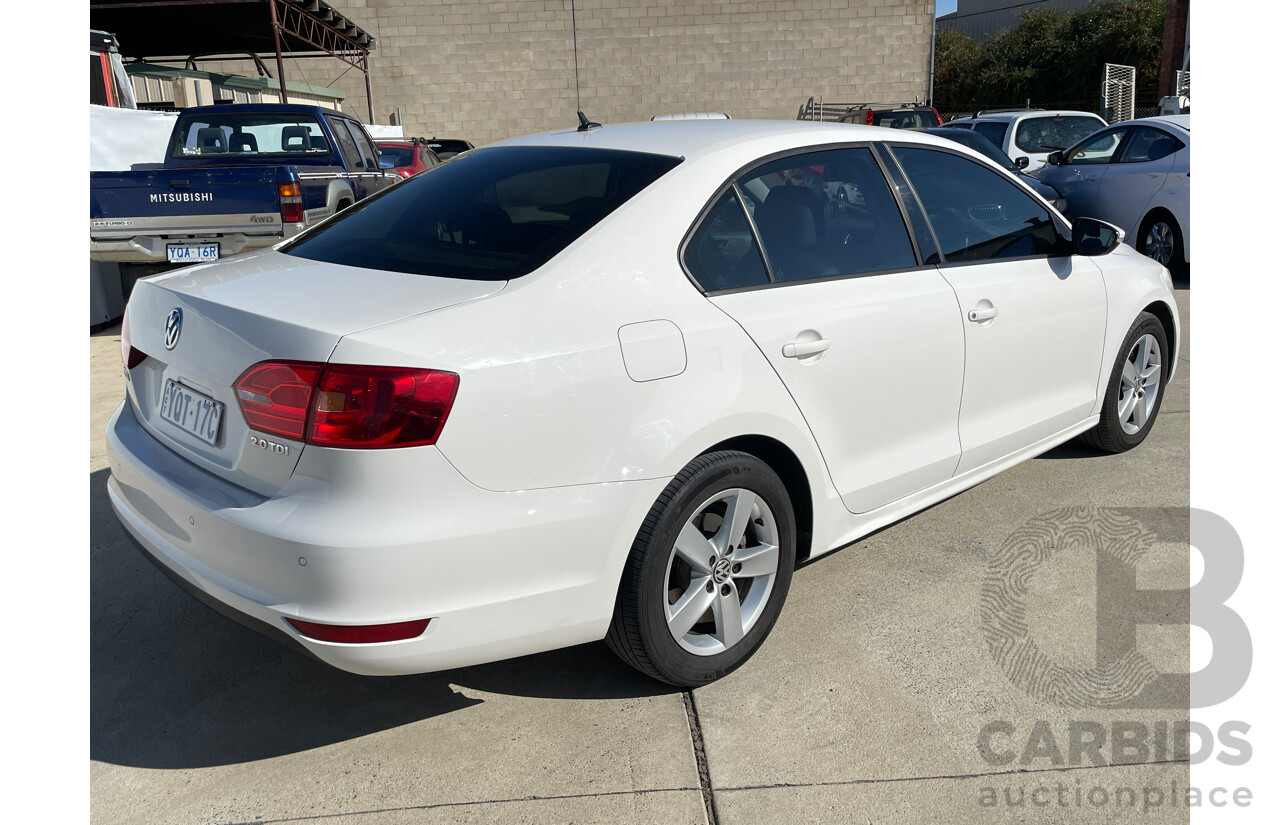 2/2012 Volkswagen Jetta 103 TDI Comfortline 1KM MY12 4d Sedan White 2.0L