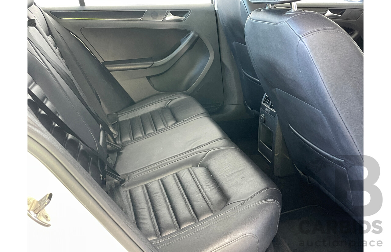 2/2012 Volkswagen Jetta 103 TDI Comfortline 1KM MY12 4d Sedan White 2.0L