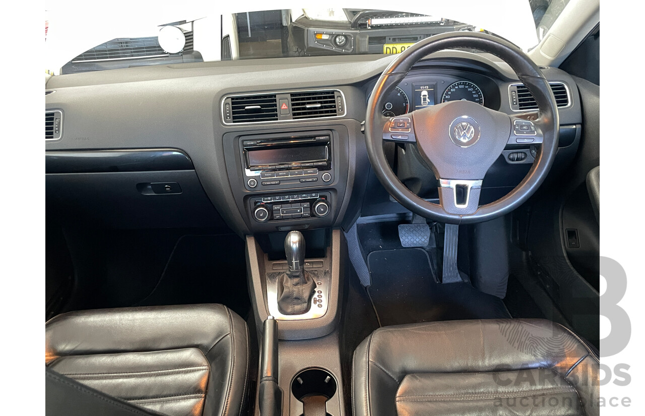 2/2012 Volkswagen Jetta 103 TDI Comfortline 1KM MY12 4d Sedan White 2.0L