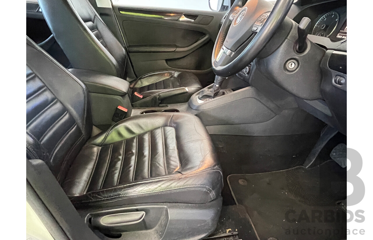 2/2012 Volkswagen Jetta 103 TDI Comfortline 1KM MY12 4d Sedan White 2.0L