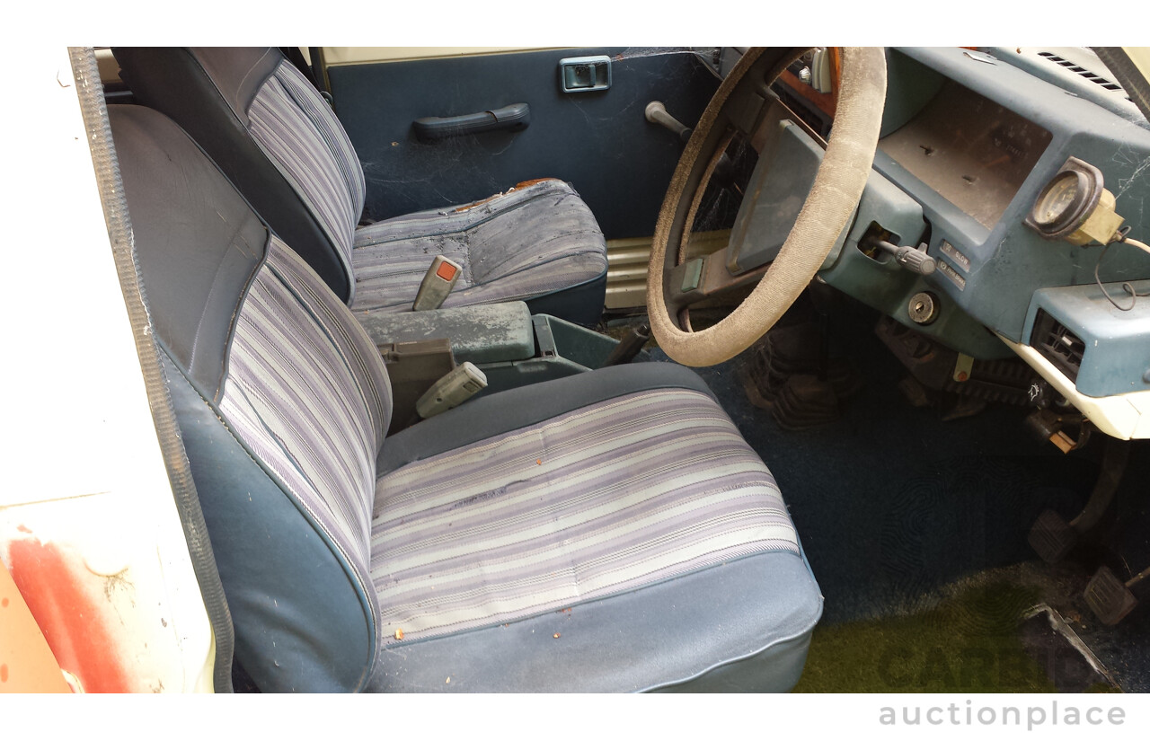 8/1981 Nissan Patrol Deluxe (4x4) Diesel 4d Wagon White 3.2L