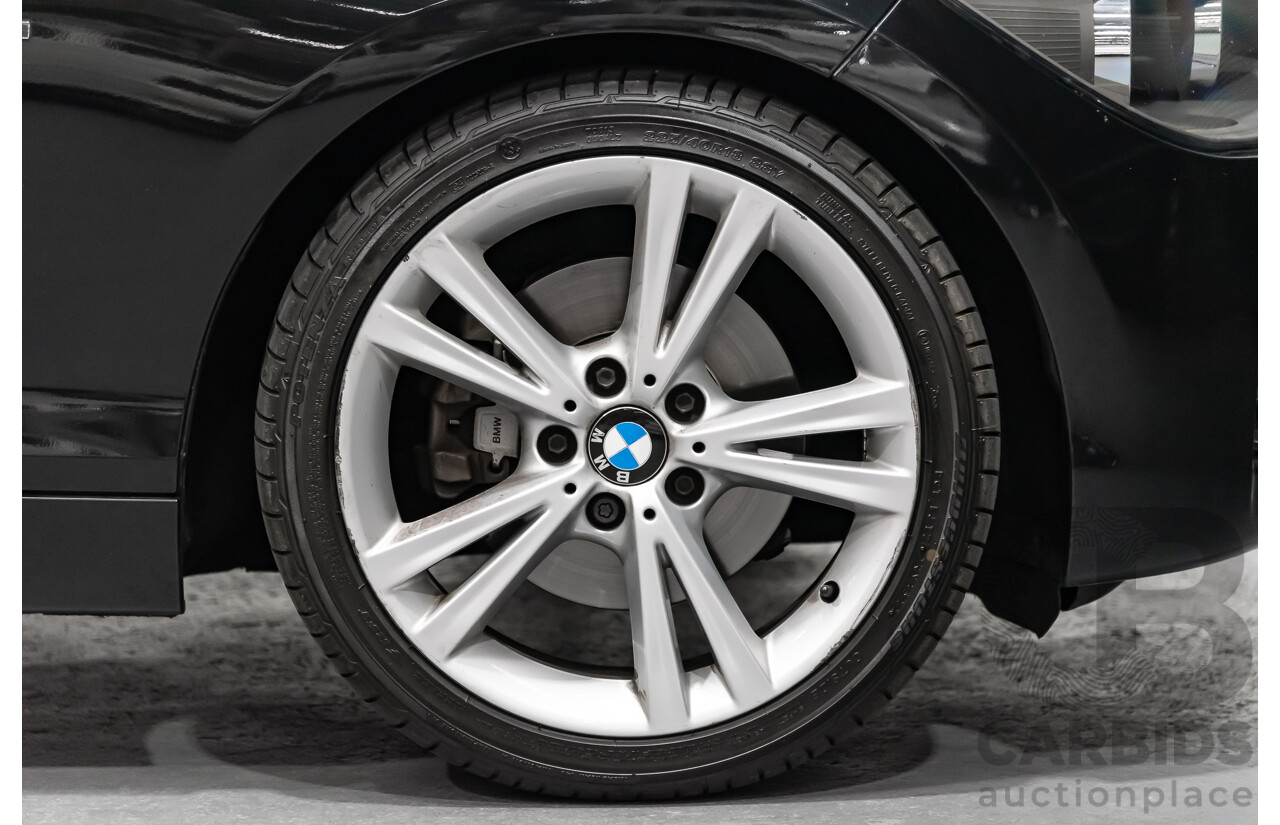 4/2014 Bmw 1 25i Sportline F20 MY14 5d Hatchback Black 2.0L