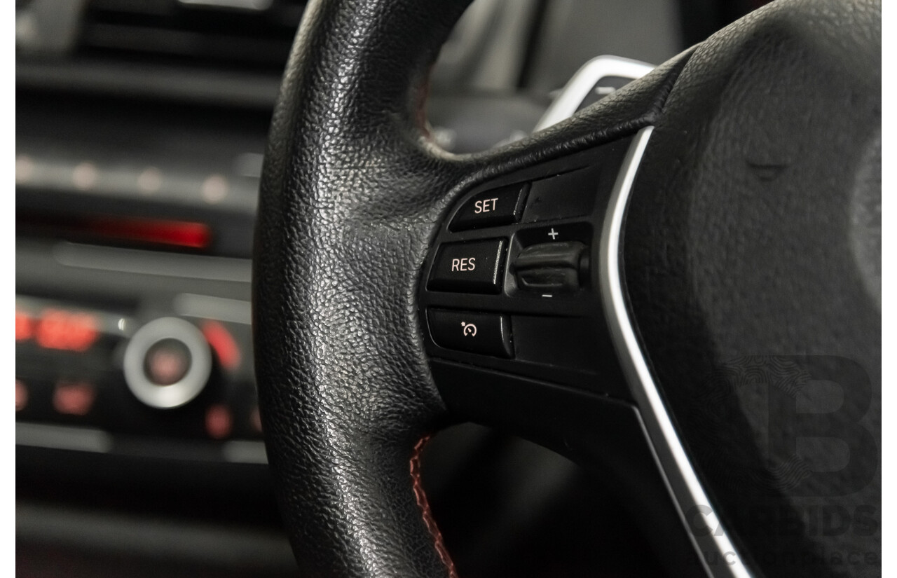 4/2014 Bmw 1 25i Sportline F20 MY14 5d Hatchback Black 2.0L