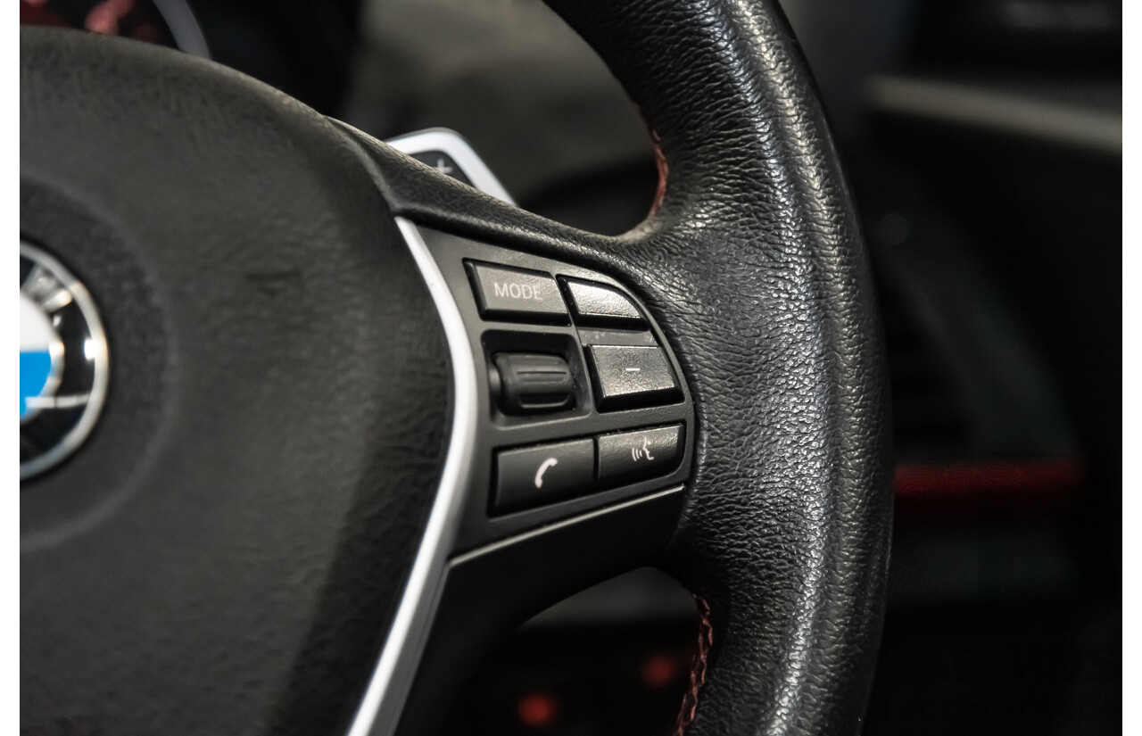 4/2014 Bmw 1 25i Sportline F20 MY14 5d Hatchback Black 2.0L