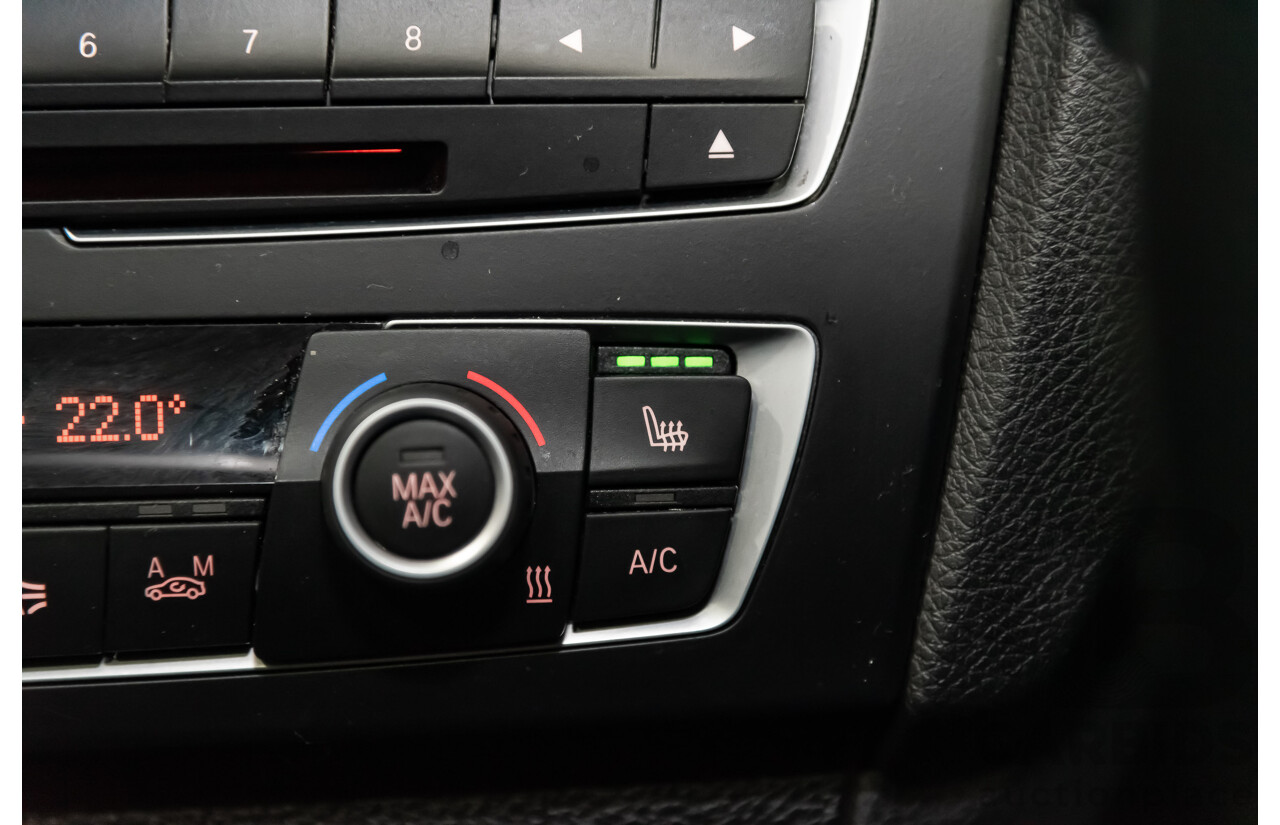 4/2014 Bmw 1 25i Sportline F20 MY14 5d Hatchback Black 2.0L