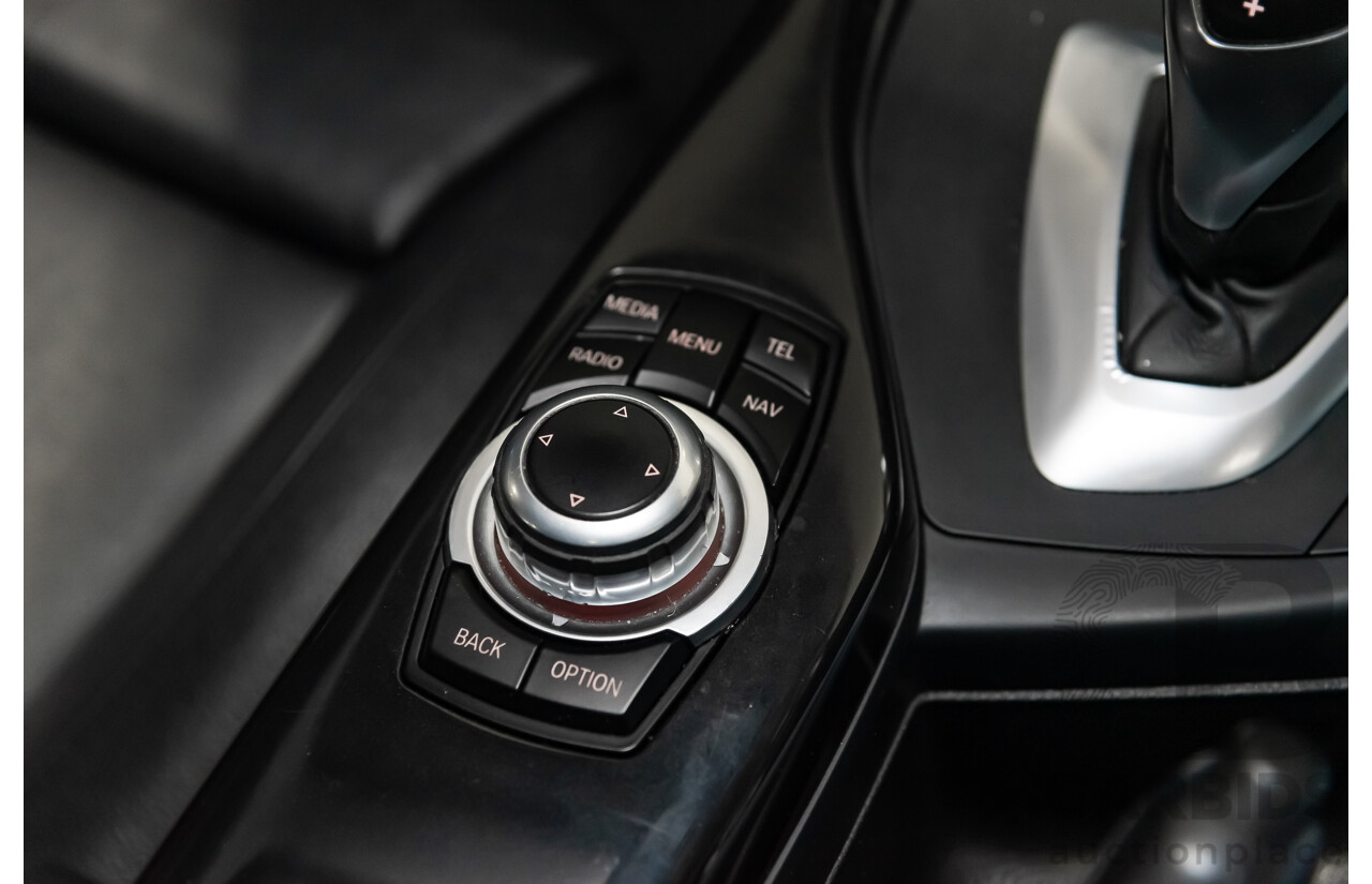 4/2014 Bmw 1 25i Sportline F20 MY14 5d Hatchback Black 2.0L