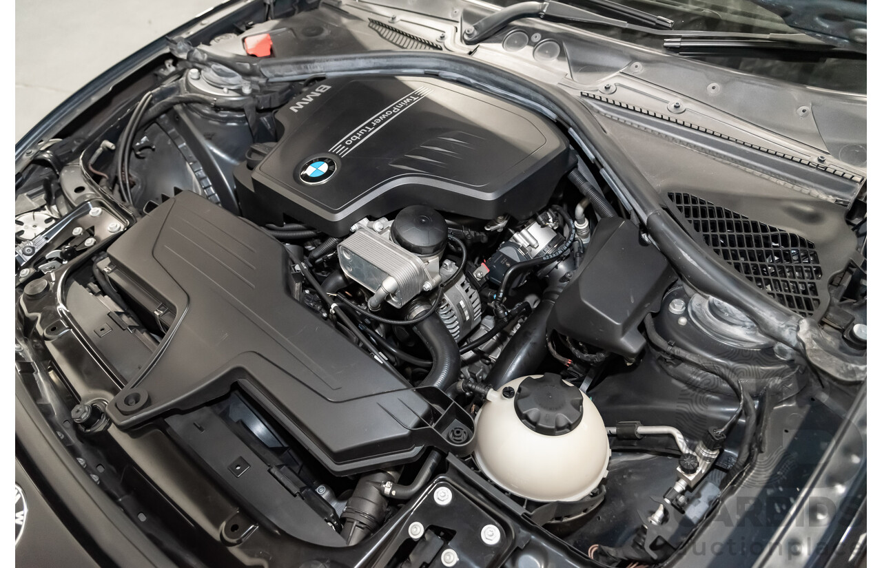 4/2014 Bmw 1 25i Sportline F20 MY14 5d Hatchback Black 2.0L