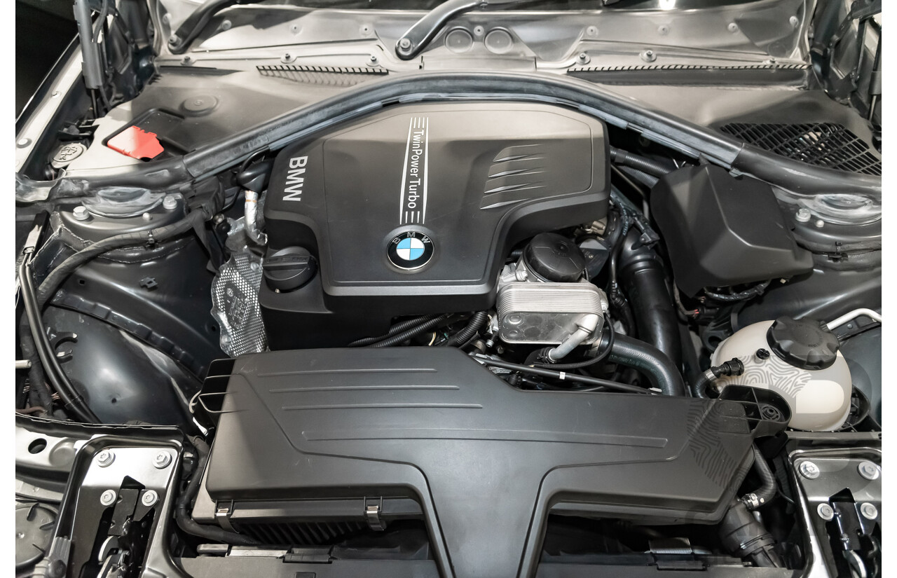 4/2014 Bmw 1 25i Sportline F20 MY14 5d Hatchback Black 2.0L