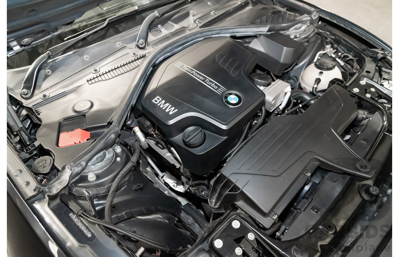 4/2014 Bmw 1 25i Sportline F20 MY14 5d Hatchback Black 2.0L