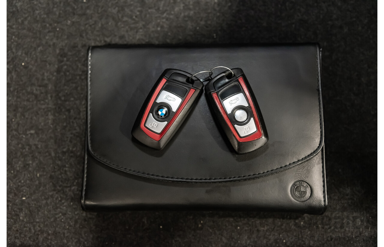 4/2014 Bmw 1 25i Sportline F20 MY14 5d Hatchback Black 2.0L