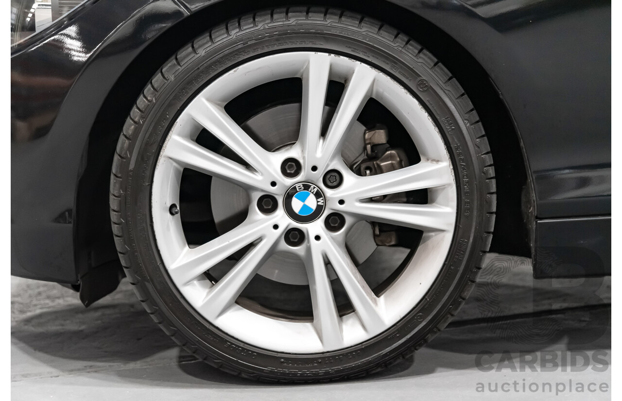 4/2014 Bmw 1 25i Sportline F20 MY14 5d Hatchback Black 2.0L