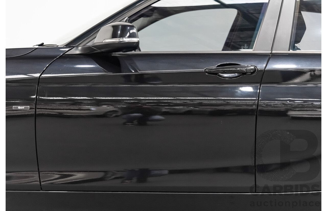 4/2014 Bmw 1 25i Sportline F20 MY14 5d Hatchback Black 2.0L