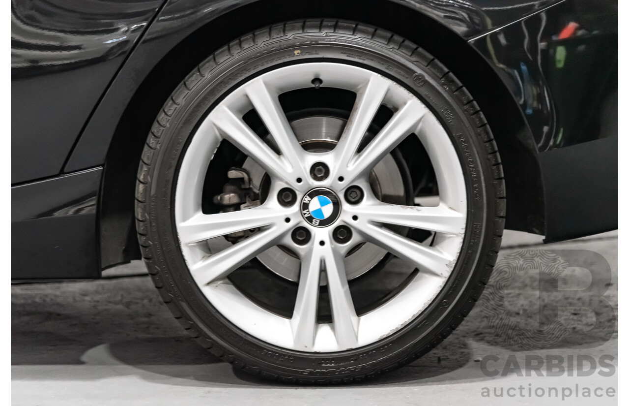 4/2014 Bmw 1 25i Sportline F20 MY14 5d Hatchback Black 2.0L