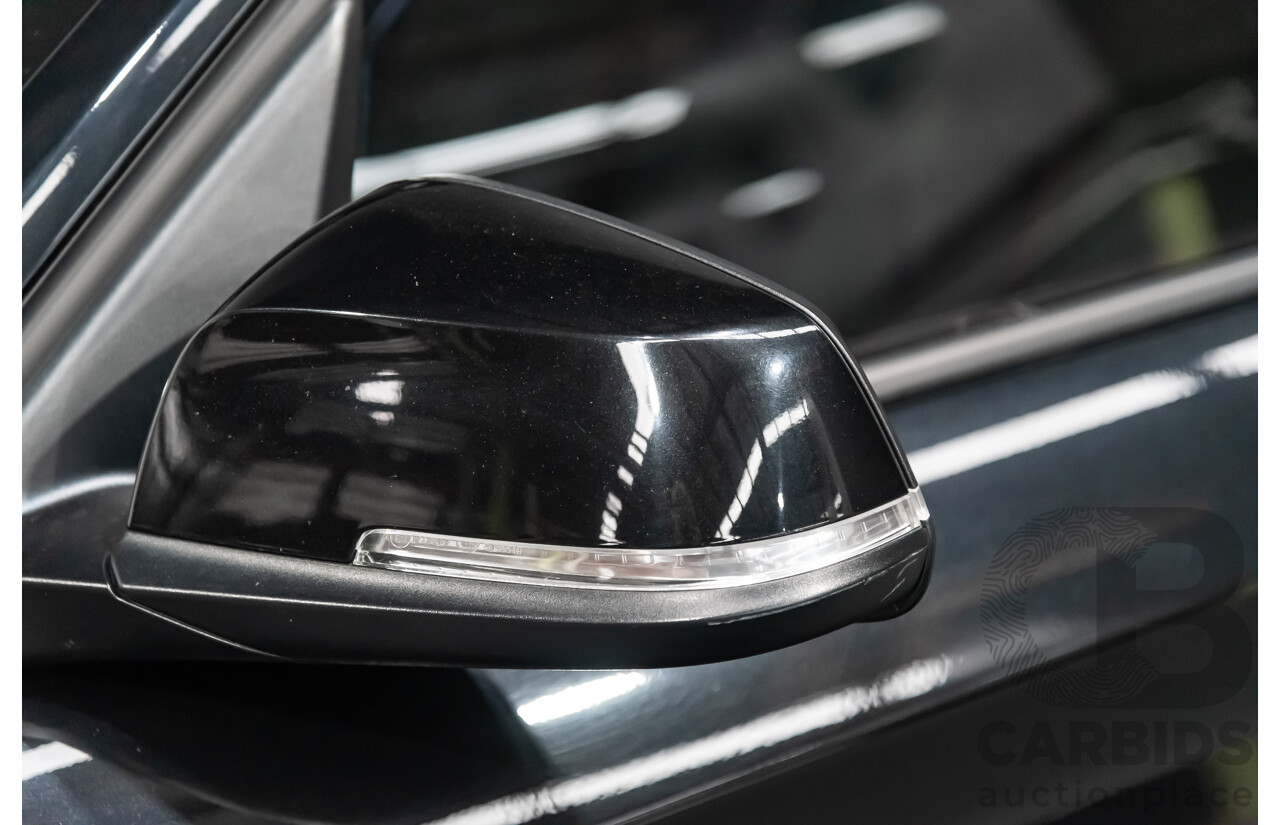 4/2014 Bmw 1 25i Sportline F20 MY14 5d Hatchback Black 2.0L