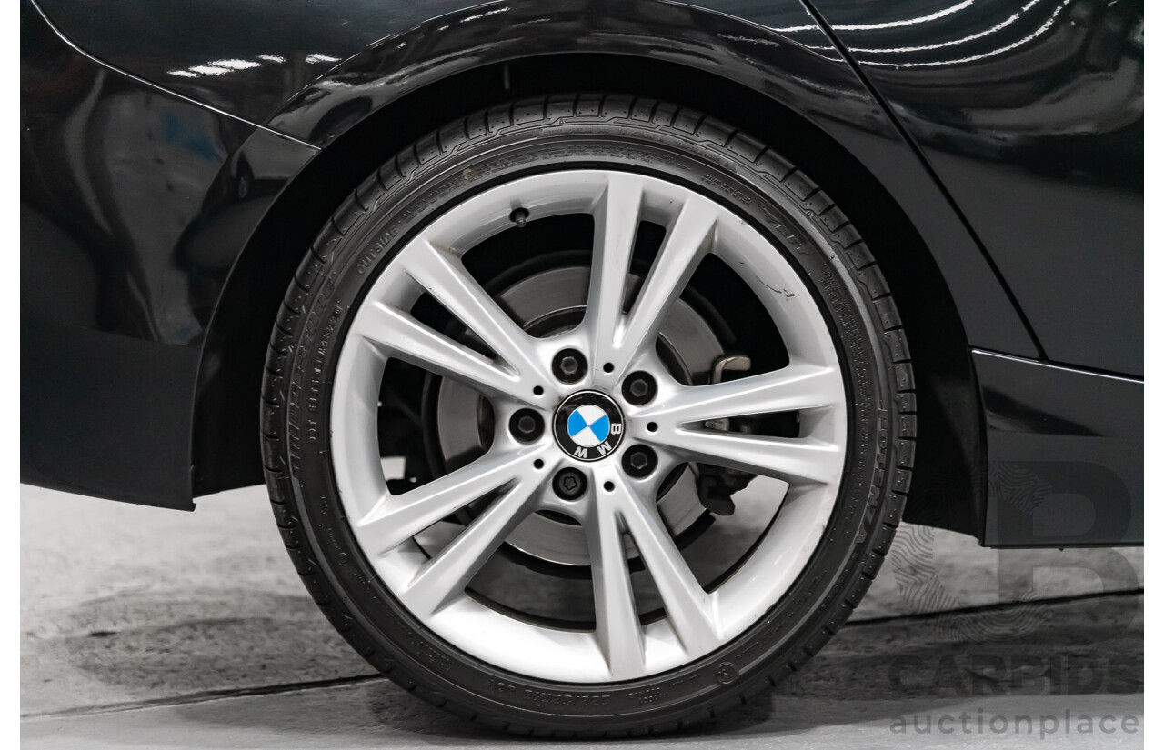 4/2014 Bmw 1 25i Sportline F20 MY14 5d Hatchback Black 2.0L