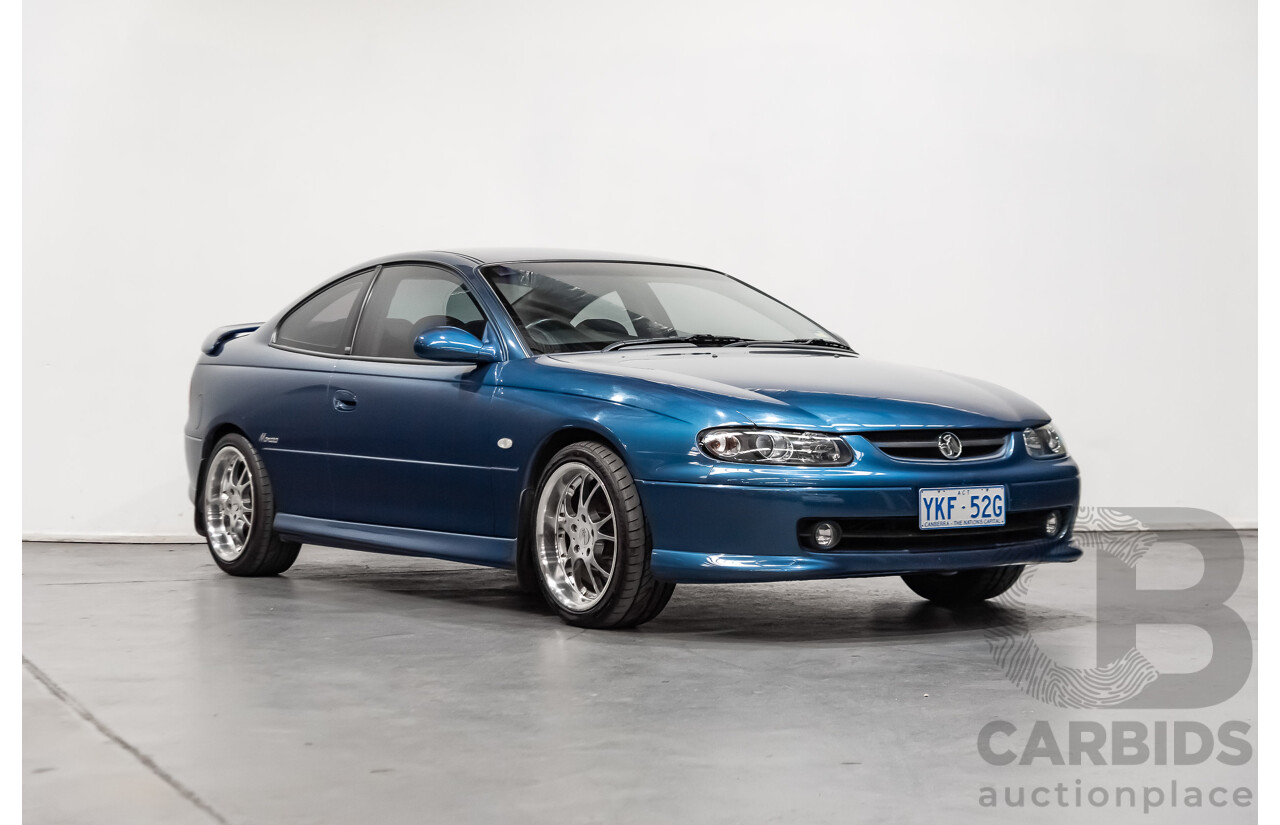 8/2002 Holden Monaro CV6 V2 2d Coupe Blue 3.8L Supercharged