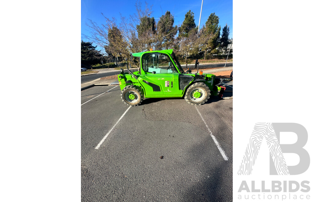 2016 MERLO Telehandler with Rotator Attachment