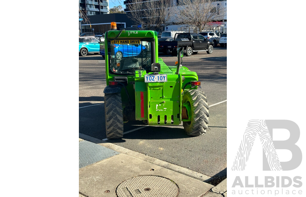 2016 MERLO Telehandler with Rotator Attachment