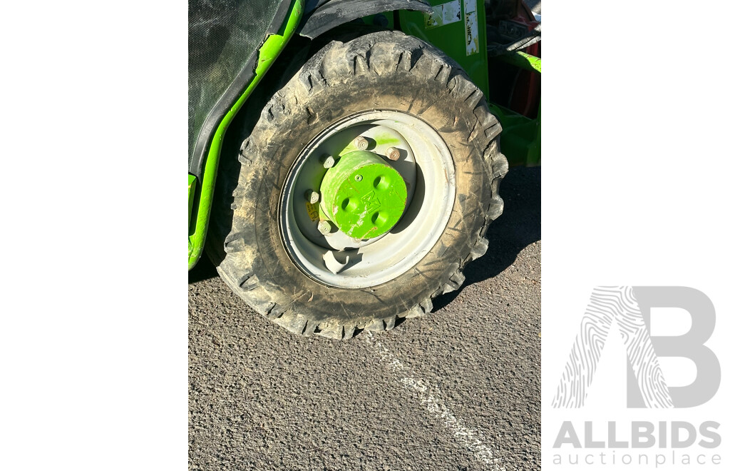 2016 MERLO Telehandler with Rotator Attachment