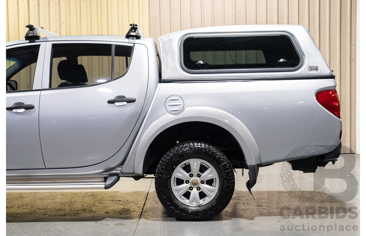 4/2011 Mitsubishi Triton GLX MN MY11 Double Cab Utility Silver Turbo Diesel 2.5L