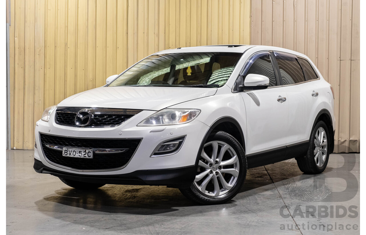 12/2010 Mazda CX-9 Grand Touring (AWD) MY10 Upgrade 4d Wagon White 7 Seater V6 3.7L