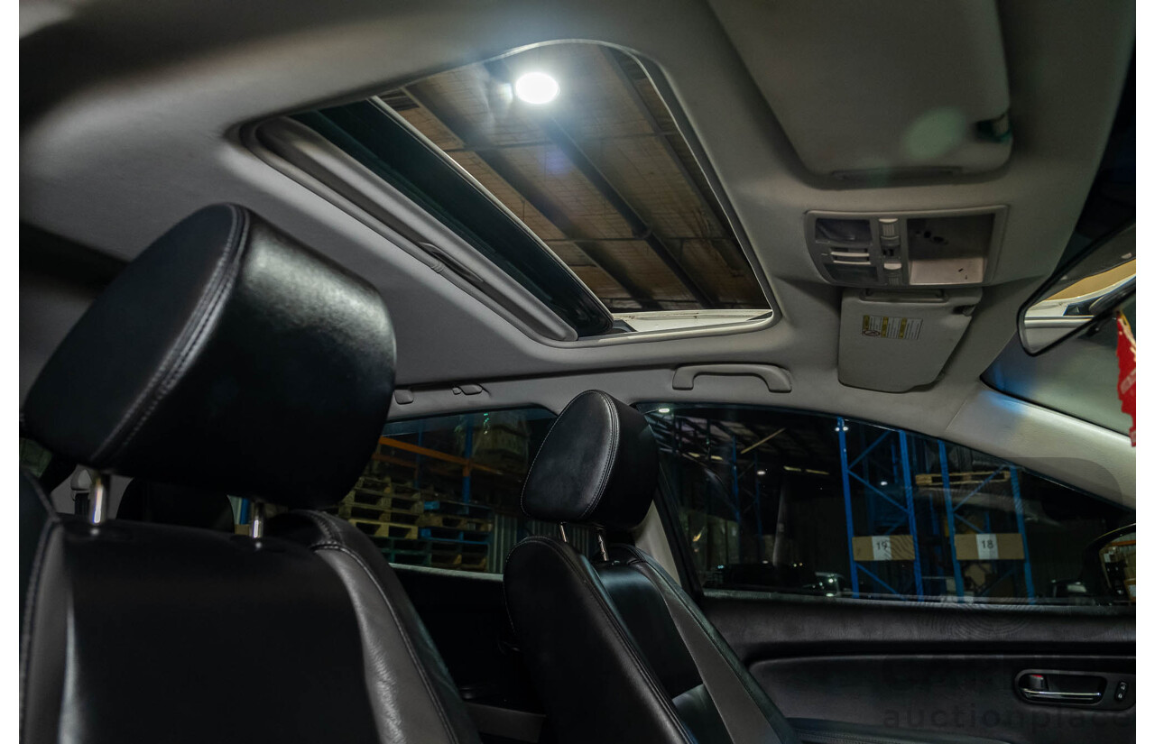 12/2010 Mazda CX-9 Grand Touring (AWD) MY10 Upgrade 4d Wagon White 7 Seater V6 3.7L