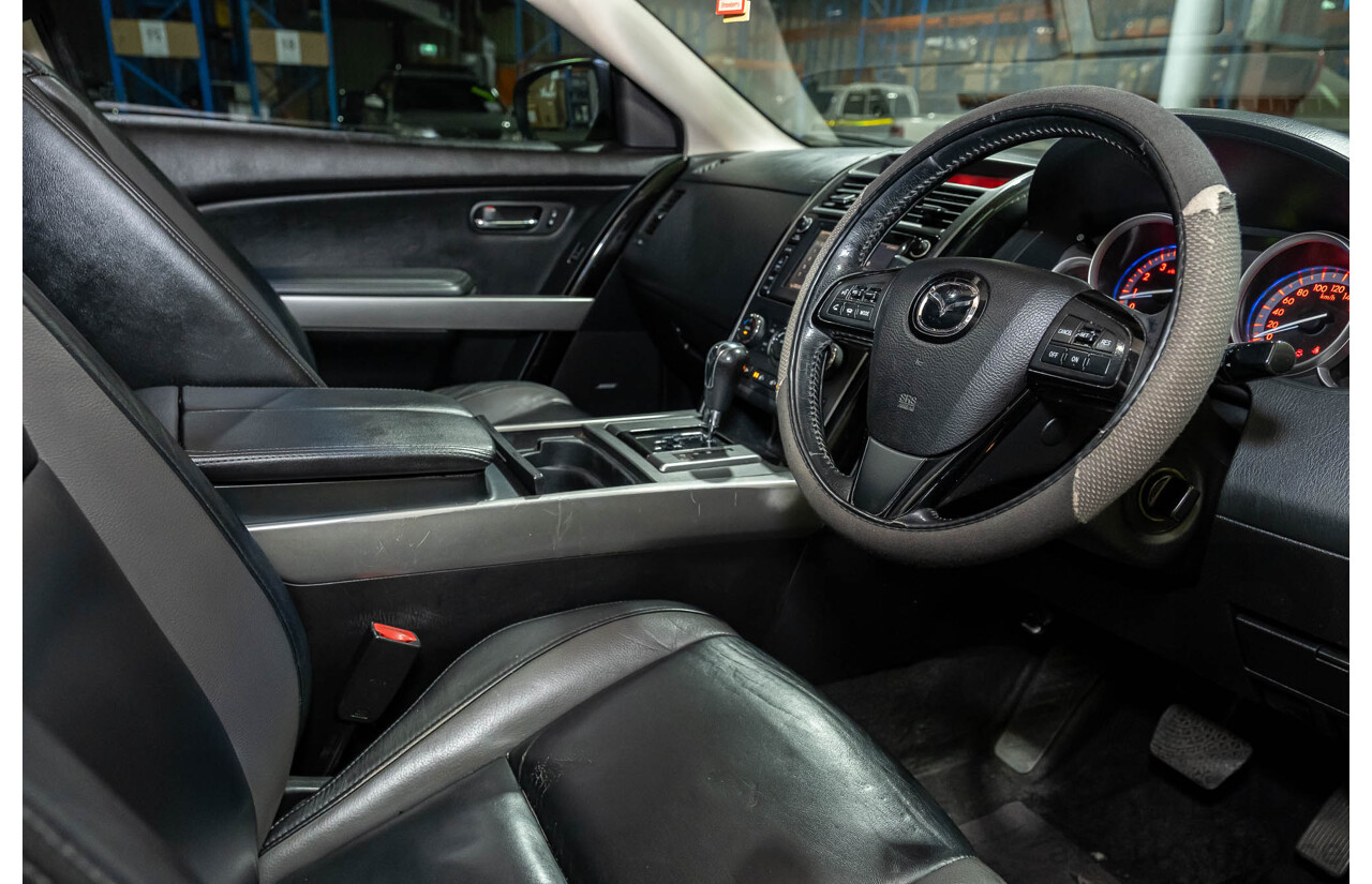 12/2010 Mazda CX-9 Grand Touring (AWD) MY10 Upgrade 4d Wagon White 7 Seater V6 3.7L