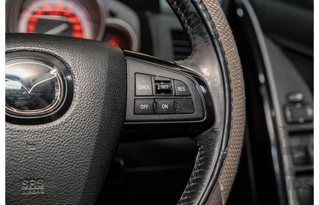 12/2010 Mazda CX-9 Grand Touring (AWD) MY10 Upgrade 4d Wagon White 7 Seater V6 3.7L