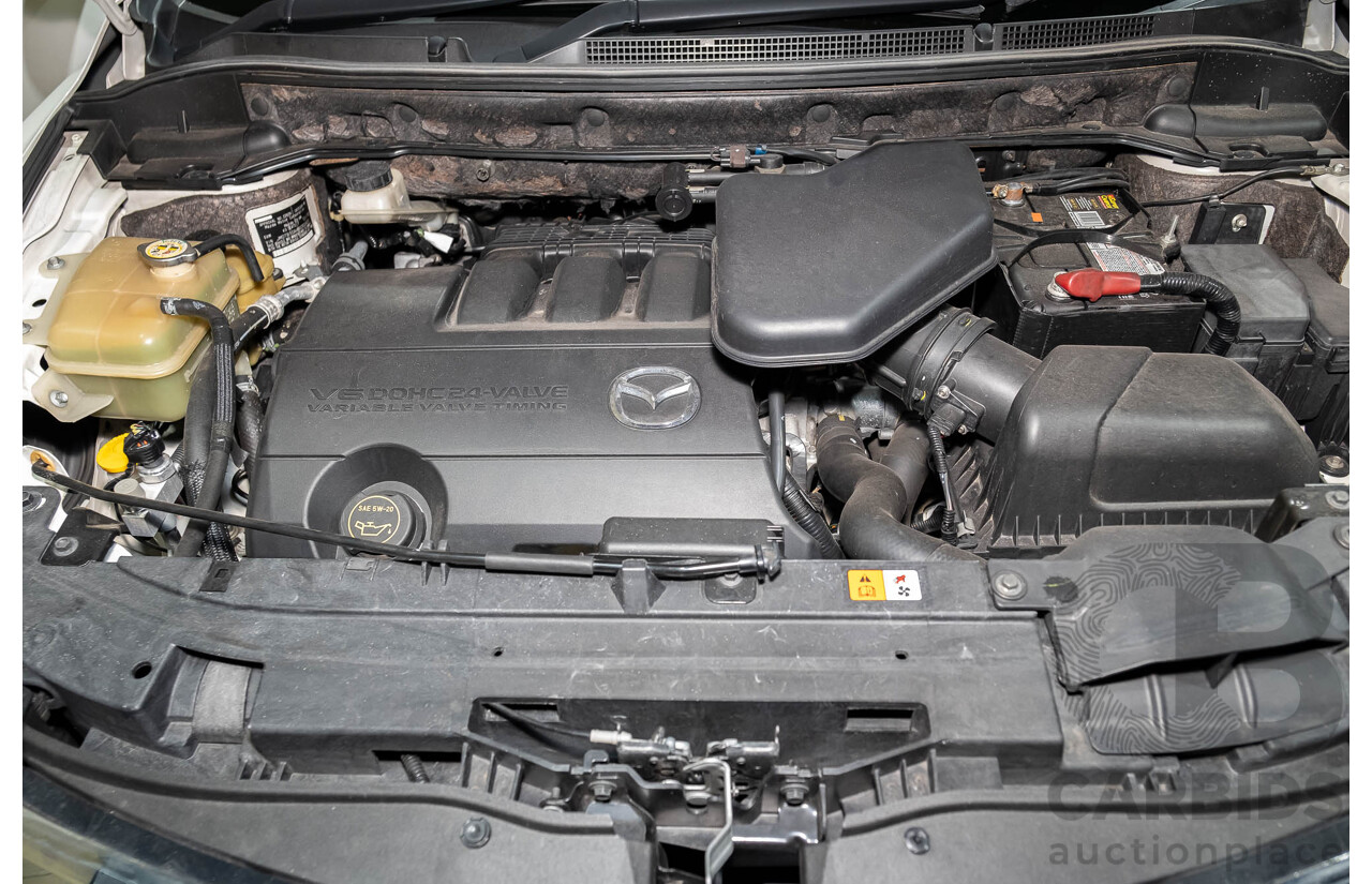 12/2010 Mazda CX-9 Grand Touring (AWD) MY10 Upgrade 4d Wagon White 7 Seater V6 3.7L