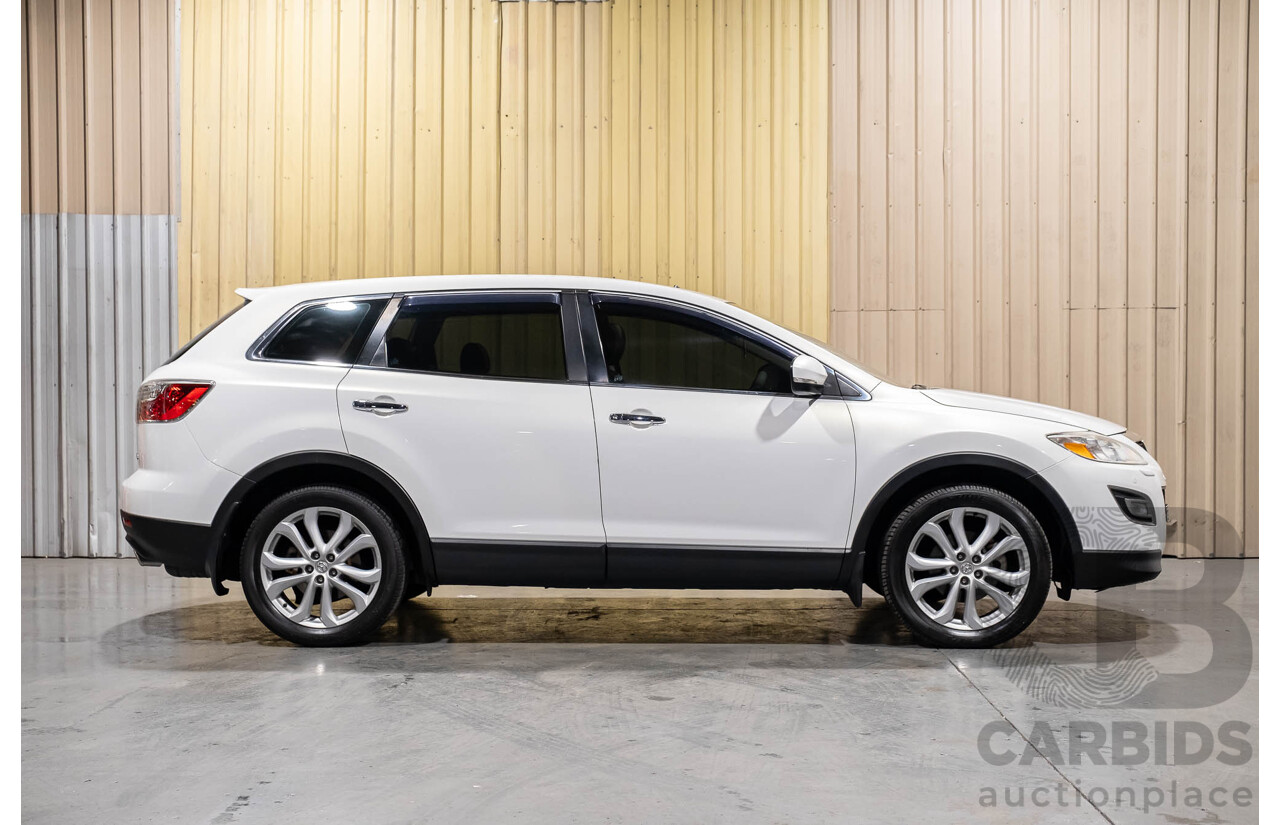 12/2010 Mazda CX-9 Grand Touring (AWD) MY10 Upgrade 4d Wagon White 7 Seater V6 3.7L