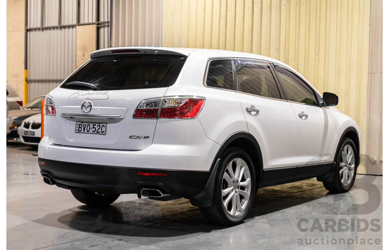 12/2010 Mazda CX-9 Grand Touring (AWD) MY10 Upgrade 4d Wagon White 7 Seater V6 3.7L