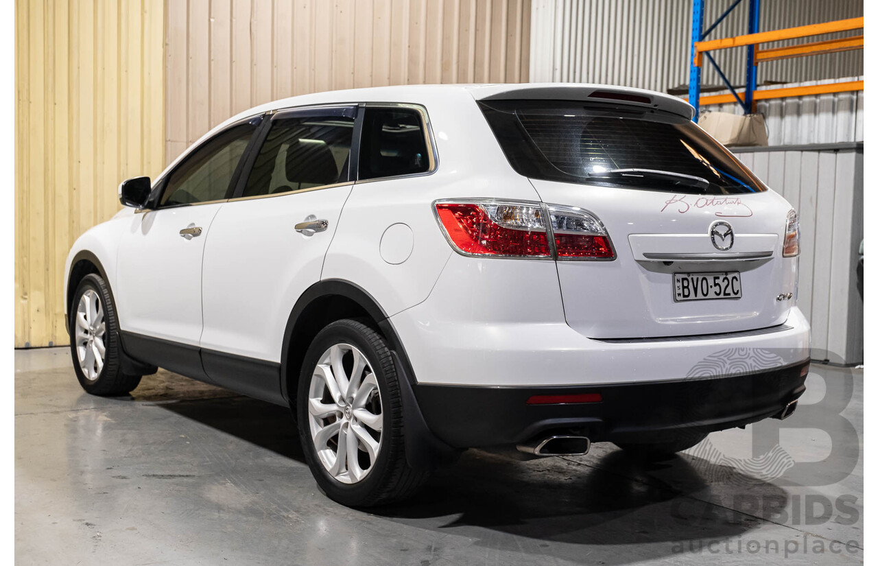 12/2010 Mazda CX-9 Grand Touring (AWD) MY10 Upgrade 4d Wagon White 7 Seater V6 3.7L
