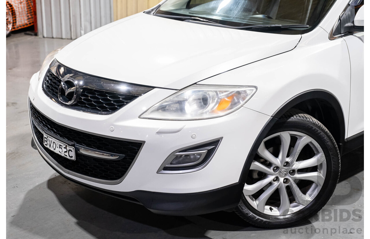 12/2010 Mazda CX-9 Grand Touring (AWD) MY10 Upgrade 4d Wagon White 7 Seater V6 3.7L
