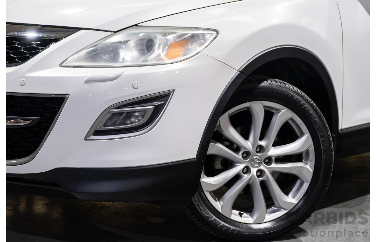 12/2010 Mazda CX-9 Grand Touring (AWD) MY10 Upgrade 4d Wagon White 7 Seater V6 3.7L