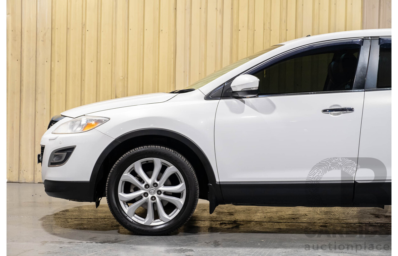 12/2010 Mazda CX-9 Grand Touring (AWD) MY10 Upgrade 4d Wagon White 7 Seater V6 3.7L
