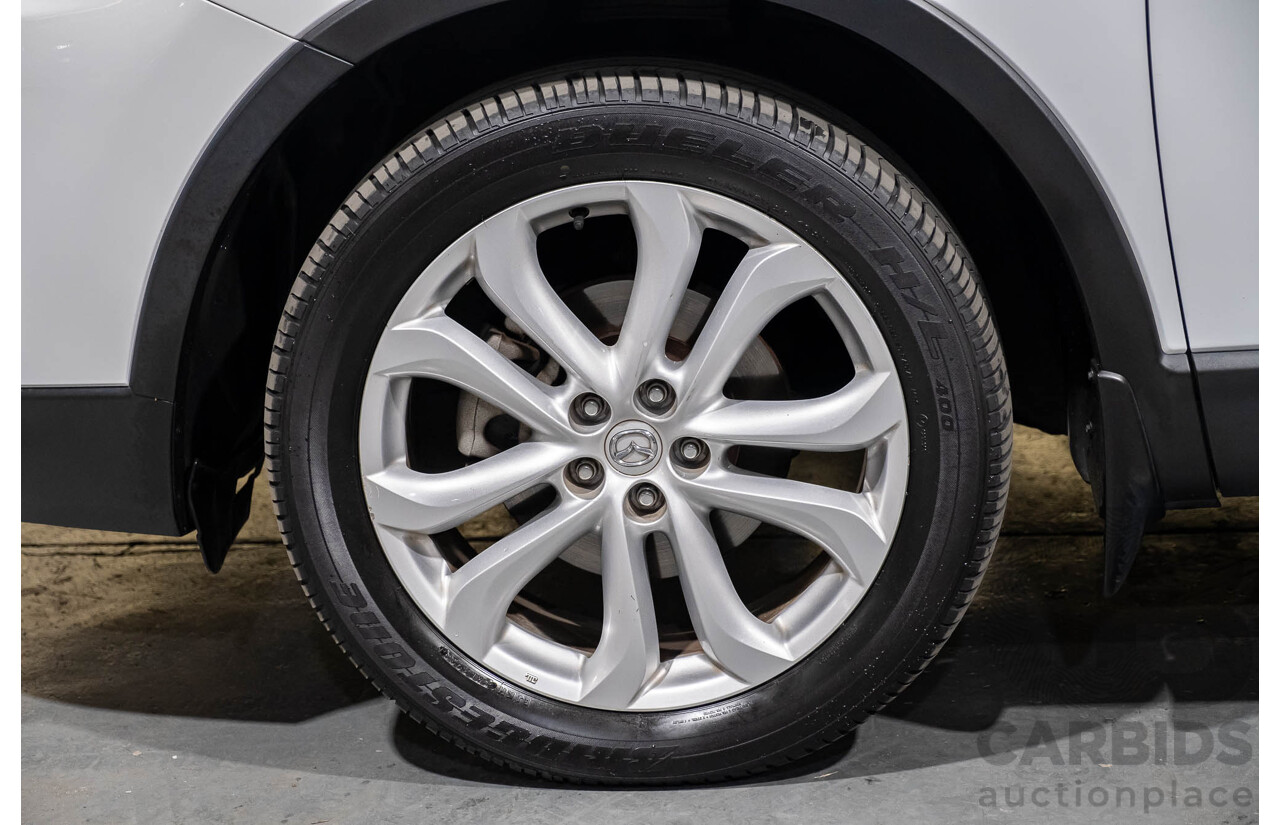 12/2010 Mazda CX-9 Grand Touring (AWD) MY10 Upgrade 4d Wagon White 7 Seater V6 3.7L