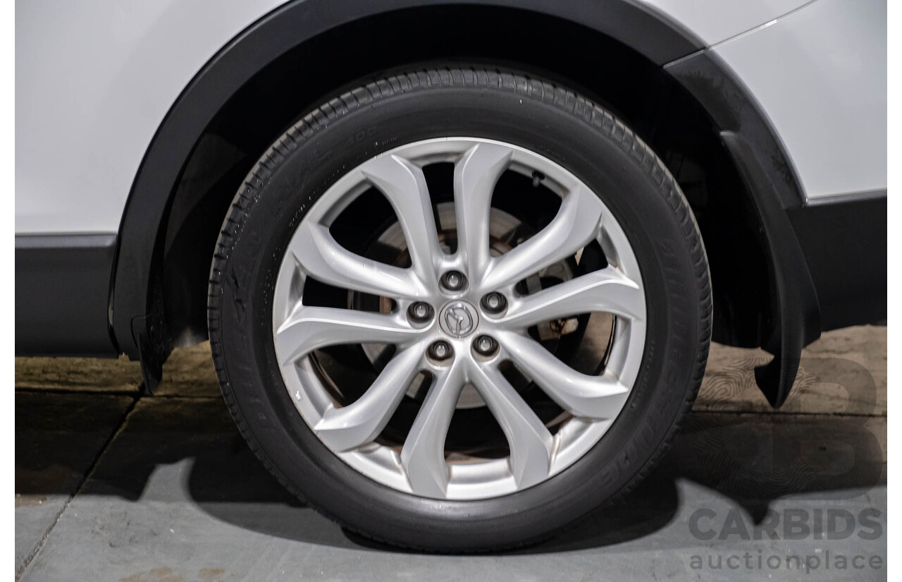 12/2010 Mazda CX-9 Grand Touring (AWD) MY10 Upgrade 4d Wagon White 7 Seater V6 3.7L