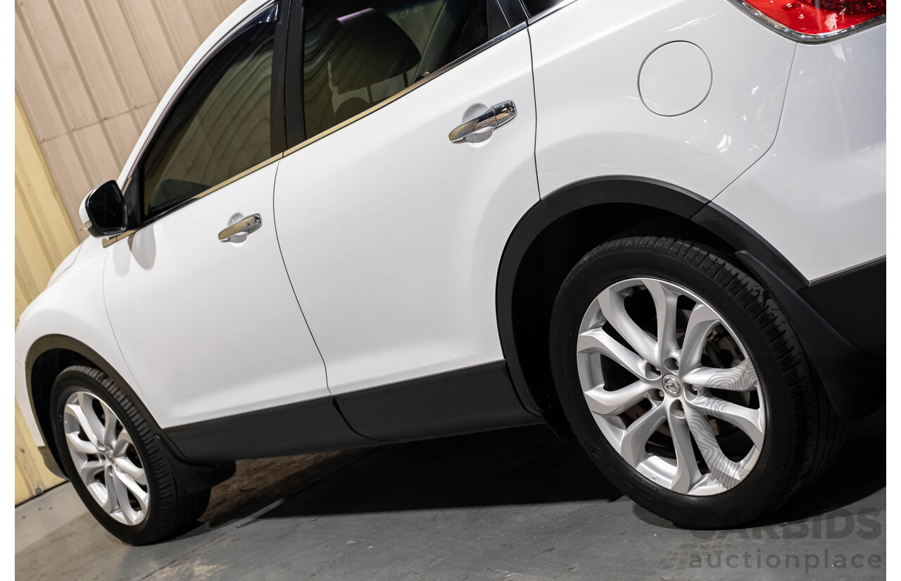 12/2010 Mazda CX-9 Grand Touring (AWD) MY10 Upgrade 4d Wagon White 7 Seater V6 3.7L