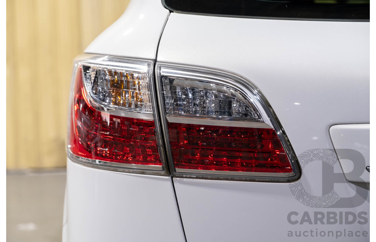 12/2010 Mazda CX-9 Grand Touring (AWD) MY10 Upgrade 4d Wagon White 7 Seater V6 3.7L