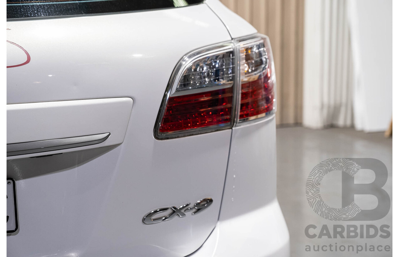 12/2010 Mazda CX-9 Grand Touring (AWD) MY10 Upgrade 4d Wagon White 7 Seater V6 3.7L