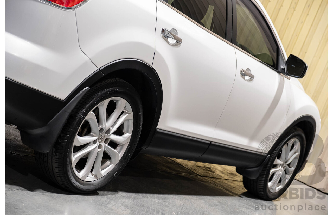 12/2010 Mazda CX-9 Grand Touring (AWD) MY10 Upgrade 4d Wagon White 7 Seater V6 3.7L