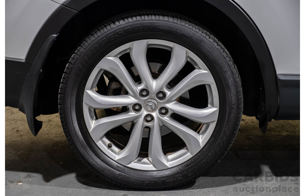 12/2010 Mazda CX-9 Grand Touring (AWD) MY10 Upgrade 4d Wagon White 7 Seater V6 3.7L