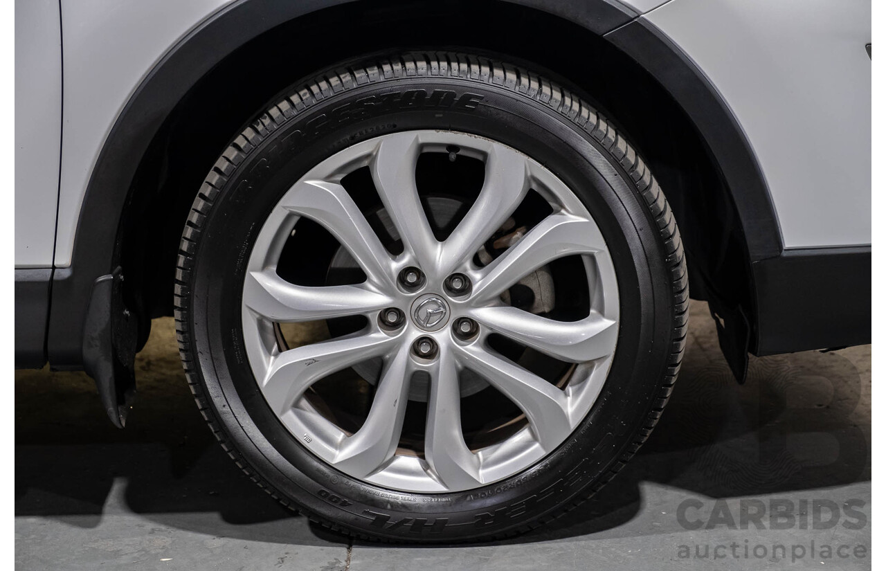 12/2010 Mazda CX-9 Grand Touring (AWD) MY10 Upgrade 4d Wagon White 7 Seater V6 3.7L