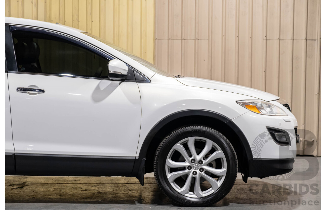 12/2010 Mazda CX-9 Grand Touring (AWD) MY10 Upgrade 4d Wagon White 7 Seater V6 3.7L