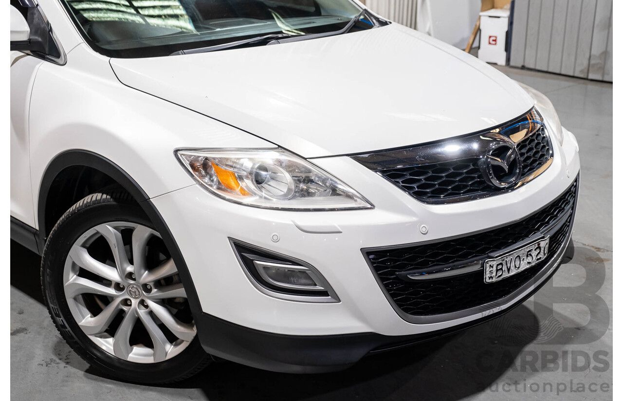 12/2010 Mazda CX-9 Grand Touring (AWD) MY10 Upgrade 4d Wagon White 7 Seater V6 3.7L