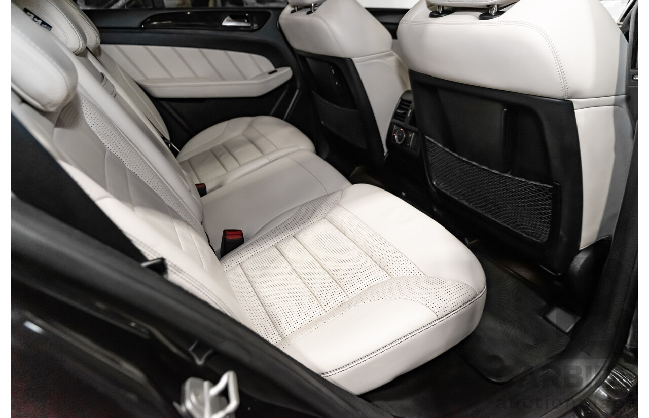 5/2014 Mercedes-Benz ML 63 AMG (4x4) 166 4d Wagon Black 5.5L Twin Turbo V8