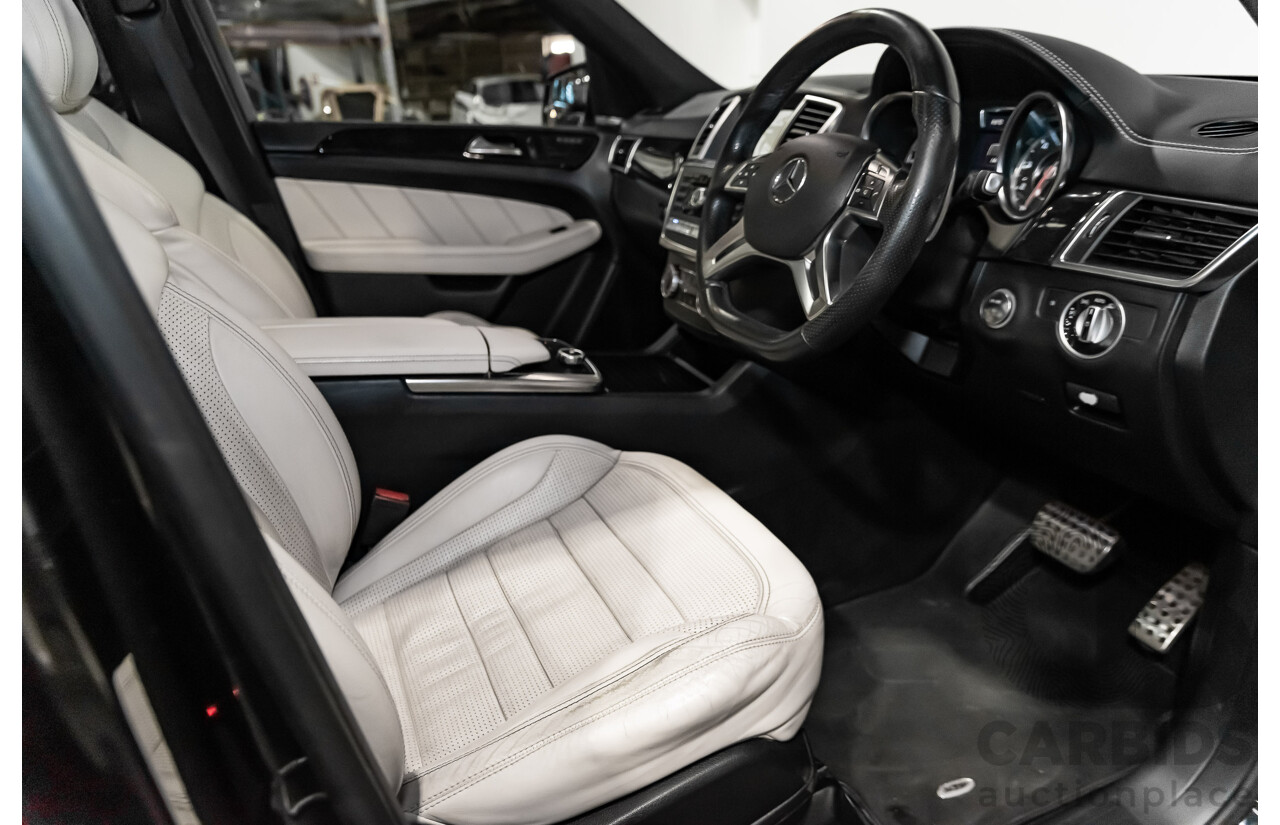 5/2014 Mercedes-Benz ML 63 AMG (4x4) 166 4d Wagon Black 5.5L Twin Turbo V8