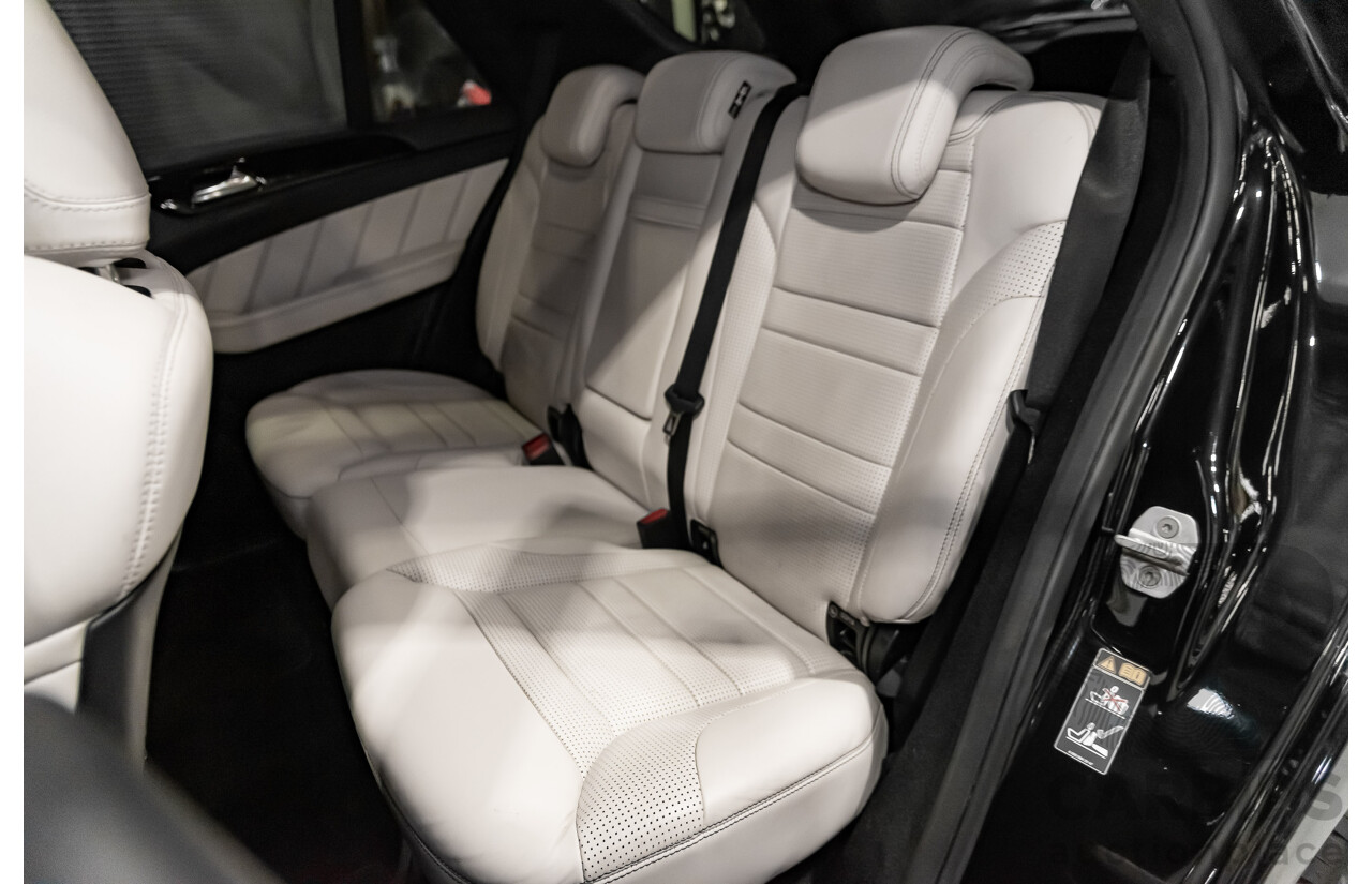 5/2014 Mercedes-Benz ML 63 AMG (4x4) 166 4d Wagon Black 5.5L Twin Turbo V8