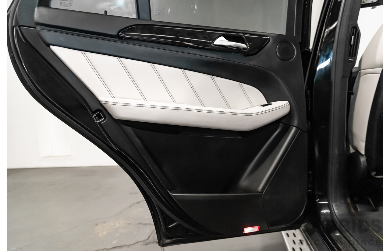 5/2014 Mercedes-Benz ML 63 AMG (4x4) 166 4d Wagon Black 5.5L Twin Turbo V8